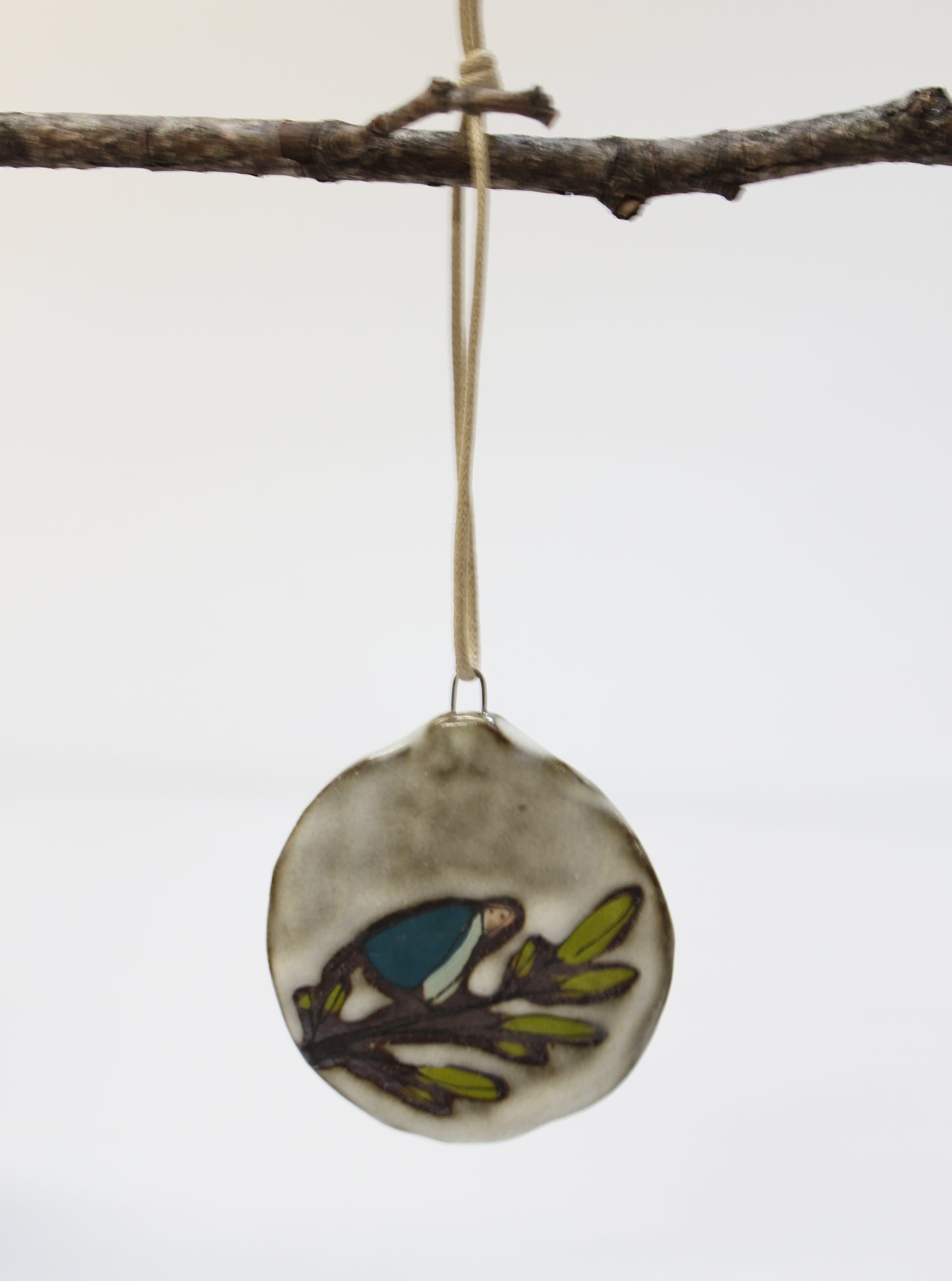 45. Teal Bird Flat Ornament. 3" x 2.5"