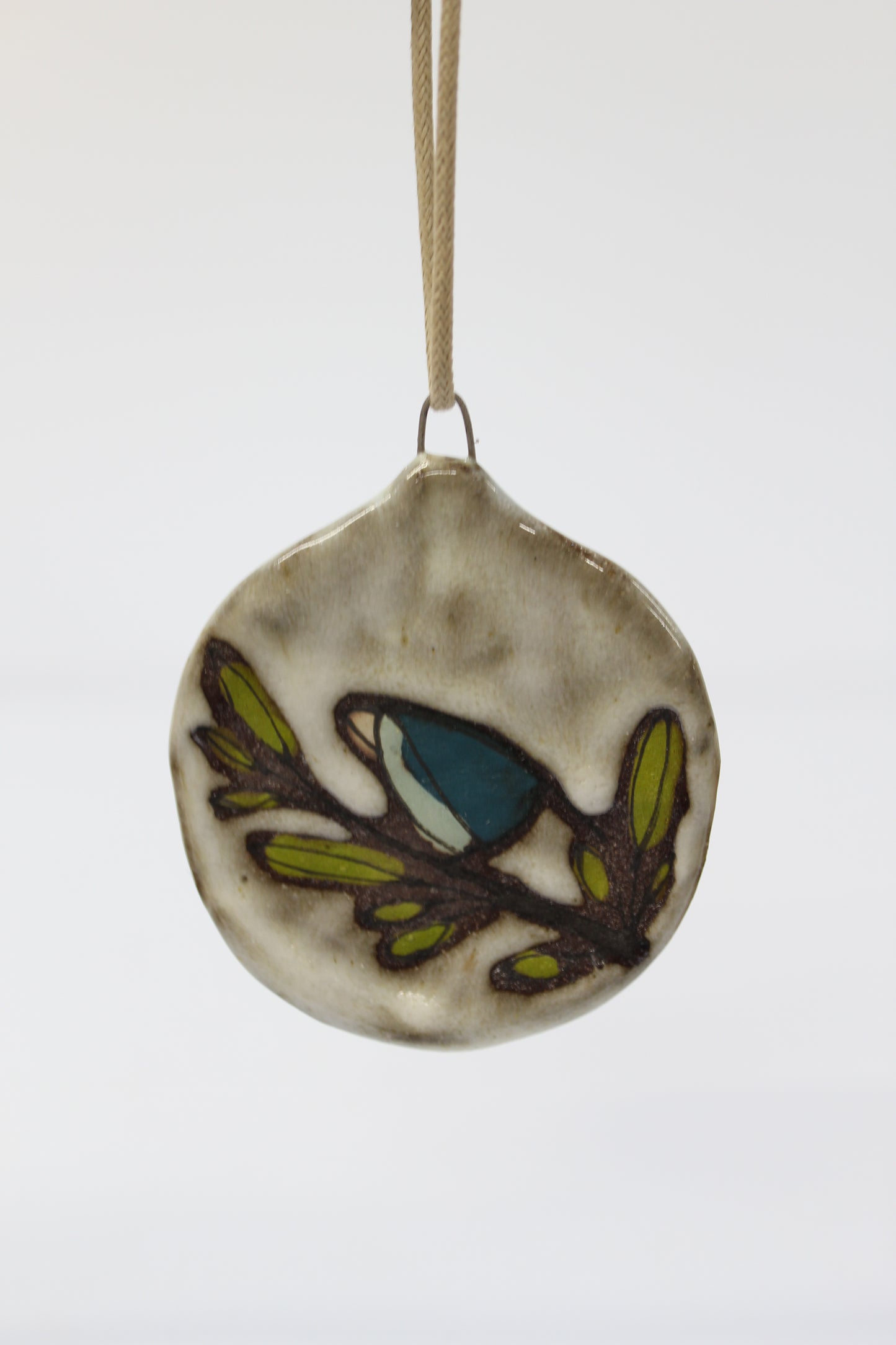 41. Teal Bird Flat Ornament. 3" x 2.5"