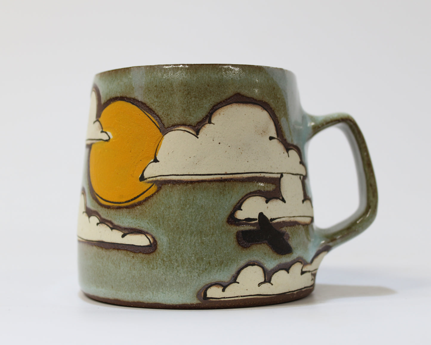 12. Thrown Clouds Mug with Drippy Turquoise Glaze. 13 oz.