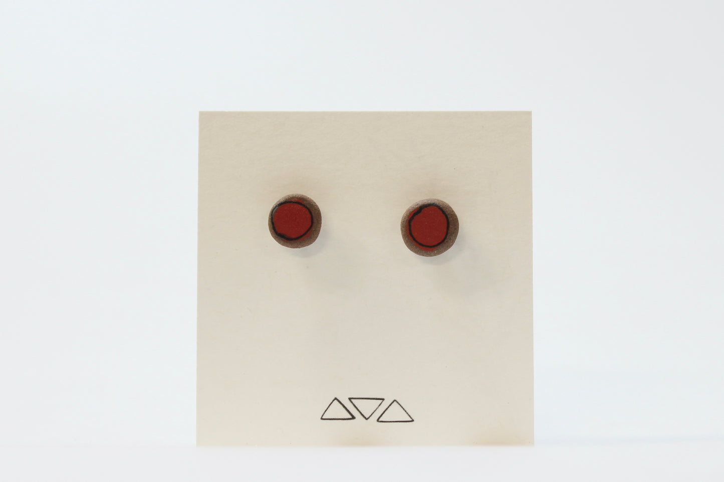 104. Wine Red Dot Stud Earrings. Stainless steel stud with stabilizer backs. 3/8"
