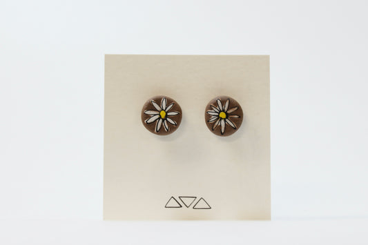 99. Daisy Stud Earrings. Stainless steel stud with stabilizer backs. 5/8"